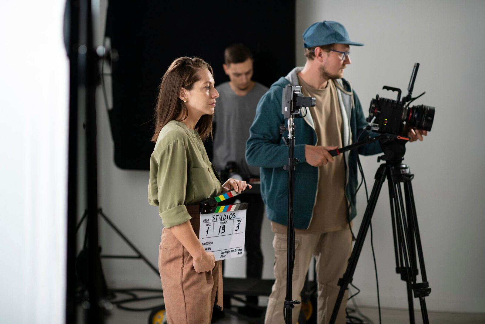 man-filming-with-professional-camera (1)